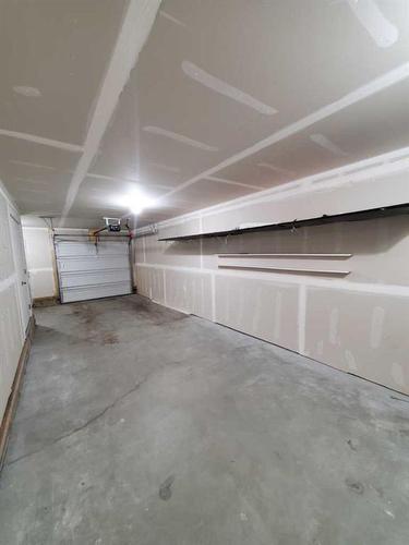 260 Copperleaf Way Se, Calgary, AB - Indoor Photo Showing Garage