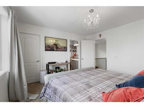 75 Auburn Bay Crescent Se, Calgary, AB - Indoor Photo Showing Bedroom