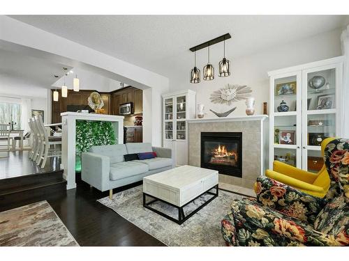 75 Auburn Bay Crescent Se, Calgary, AB - Indoor Photo Showing Living Room With Fireplace