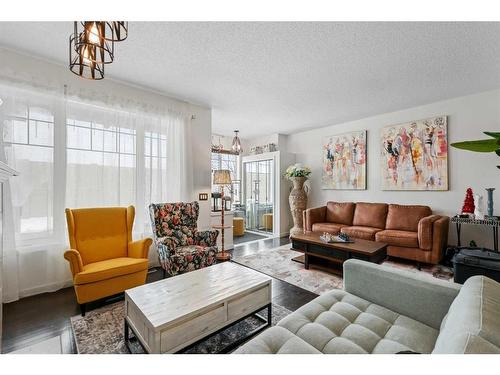 75 Auburn Bay Crescent Se, Calgary, AB - Indoor Photo Showing Living Room