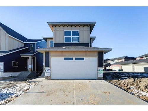 20 Sunvalley View, Cochrane, AB - Outdoor With Facade