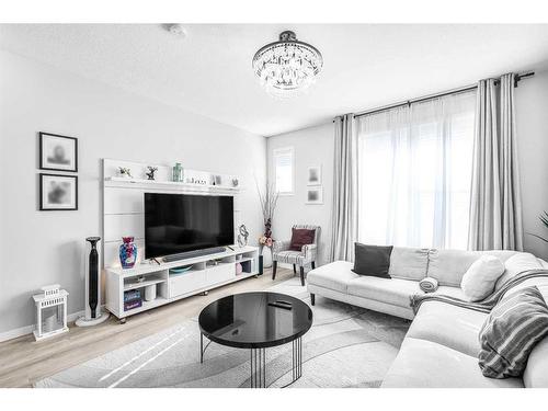 307 Copperstone Manor Se, Calgary, AB - Indoor Photo Showing Living Room