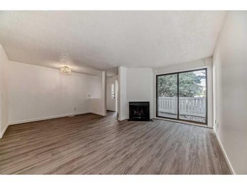 13-3015 51 Street Sw, Calgary, AB - Indoor With Fireplace