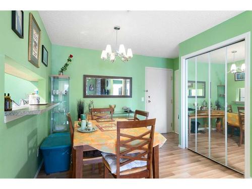 105-55 Arbour Grove Close Nw, Calgary, AB - Indoor Photo Showing Dining Room