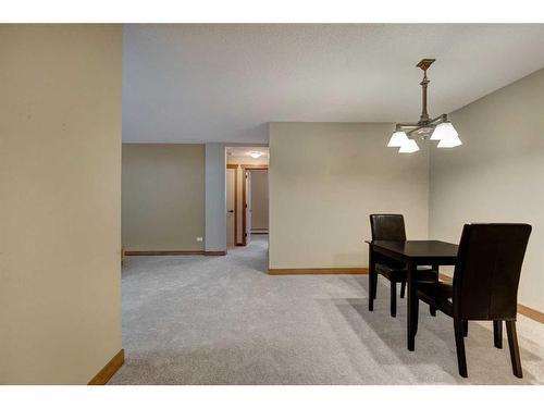 107-920 68 Avenue Sw, Calgary, AB - Indoor Photo Showing Dining Room