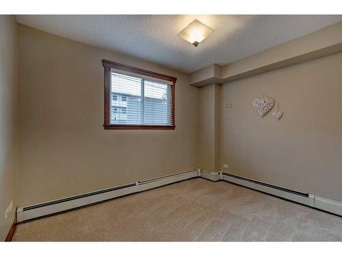 107-920 68 Avenue Sw, Calgary, AB - Indoor Photo Showing Other Room