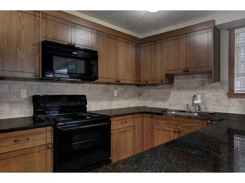 107-920 68 Avenue Sw, Calgary, AB - Indoor Photo Showing Kitchen