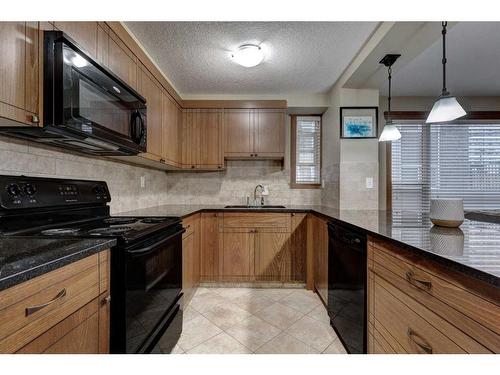 107-920 68 Avenue Sw, Calgary, AB - Indoor Photo Showing Kitchen