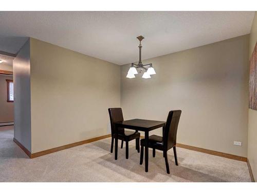 107-920 68 Avenue Sw, Calgary, AB - Indoor Photo Showing Dining Room