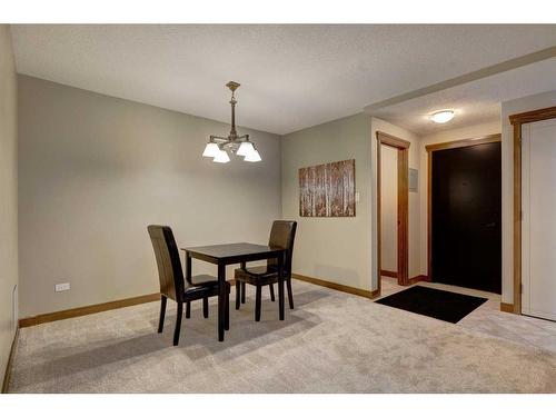 107-920 68 Avenue Sw, Calgary, AB - Indoor Photo Showing Dining Room