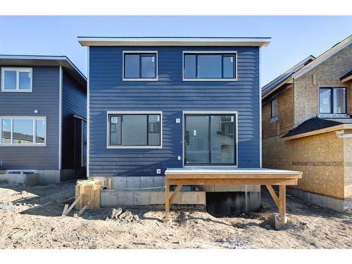 24 Sunvalley View, Cochrane, AB - Indoor Photo Showing Kitchen With Double Sink With Upgraded Kitchen