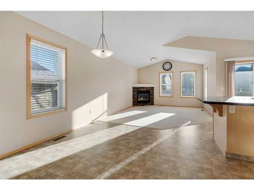 27 Covecreek Place Ne, Calgary, AB - Indoor With Fireplace