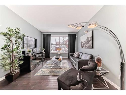 703-10 Auburn Bay Avenue Se, Calgary, AB - Indoor Photo Showing Living Room