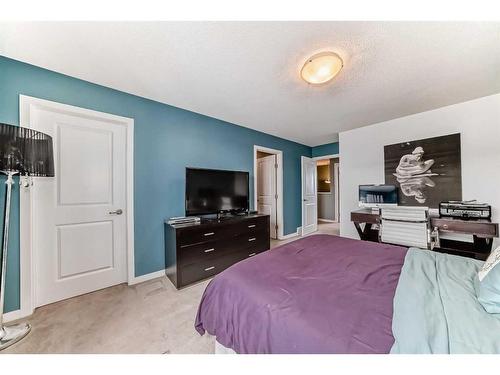 703-10 Auburn Bay Avenue Se, Calgary, AB - Indoor Photo Showing Bedroom