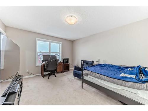 703-10 Auburn Bay Avenue Se, Calgary, AB - Indoor Photo Showing Bedroom