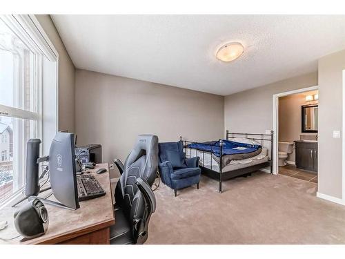 703-10 Auburn Bay Avenue Se, Calgary, AB - Indoor Photo Showing Bedroom