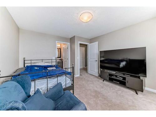 703-10 Auburn Bay Avenue Se, Calgary, AB - Indoor Photo Showing Bedroom