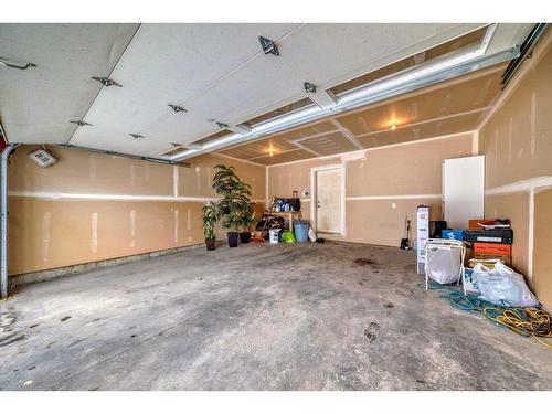 703-10 Auburn Bay Avenue Se, Calgary, AB - Indoor Photo Showing Garage