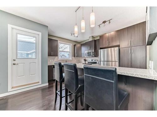 703-10 Auburn Bay Avenue Se, Calgary, AB - Indoor Photo Showing Kitchen With Stainless Steel Kitchen With Upgraded Kitchen