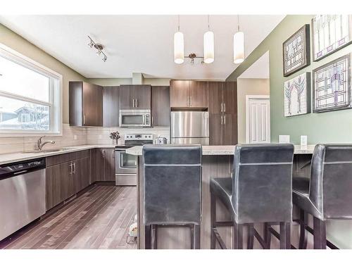 703-10 Auburn Bay Avenue Se, Calgary, AB - Indoor Photo Showing Kitchen With Stainless Steel Kitchen With Upgraded Kitchen