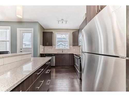 703-10 Auburn Bay Avenue Se, Calgary, AB - Indoor Photo Showing Kitchen With Stainless Steel Kitchen With Upgraded Kitchen