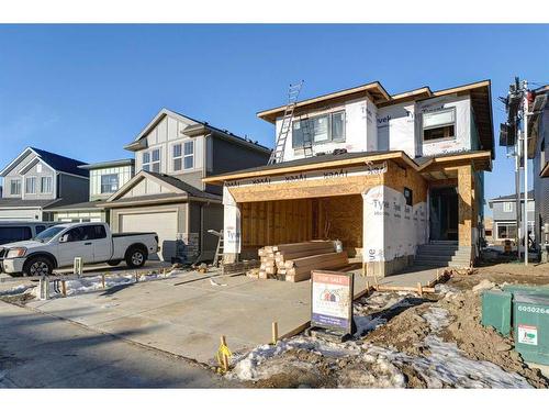 61 Quartz Crescent, Cochrane, AB - Outdoor With Facade