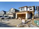 61 Quartz Crescent, Cochrane, AB  - Outdoor With Facade 