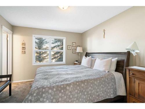 149 Tuscany Drive Nw, Calgary, AB - Indoor Photo Showing Bedroom