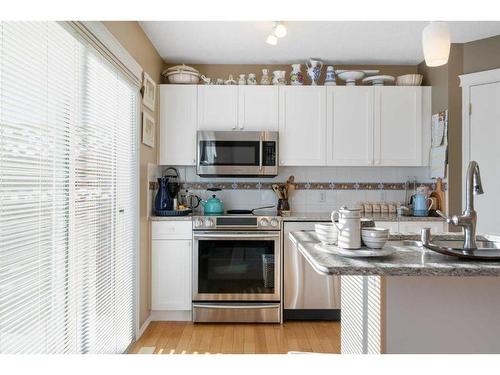 149 Tuscany Drive Nw, Calgary, AB - Indoor Photo Showing Living Room