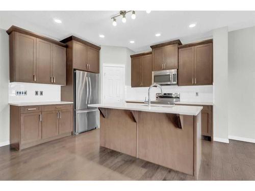 217 Hillcrest Drive Sw, Airdrie, AB - Indoor Photo Showing Kitchen With Stainless Steel Kitchen