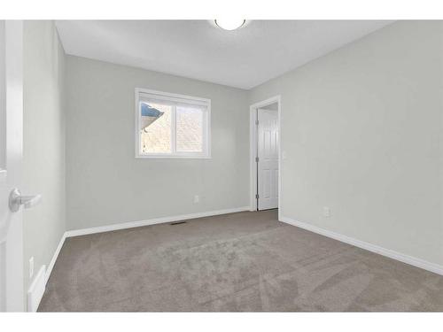 217 Hillcrest Drive Sw, Airdrie, AB - Indoor Photo Showing Other Room