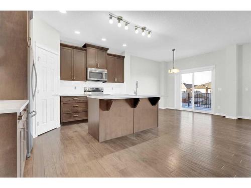 217 Hillcrest Drive Sw, Airdrie, AB - Indoor Photo Showing Kitchen