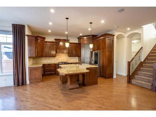 208 Coopers Grove Sw, Airdrie, AB - Indoor Photo Showing Kitchen With Upgraded Kitchen