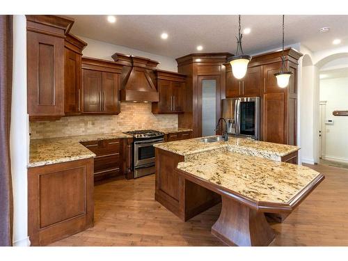 208 Coopers Grove Sw, Airdrie, AB - Indoor Photo Showing Kitchen With Double Sink With Upgraded Kitchen