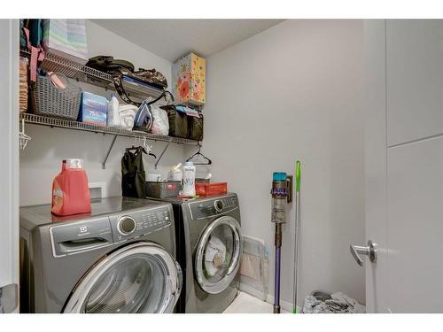 103 Cityside Terrace Ne, Calgary, AB - Indoor Photo Showing Laundry Room