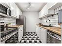 305-540 18 Avenue Sw, Calgary, AB  - Indoor Photo Showing Kitchen With Stainless Steel Kitchen 