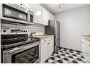 305-540 18 Avenue Sw, Calgary, AB  - Indoor Photo Showing Kitchen With Double Sink 