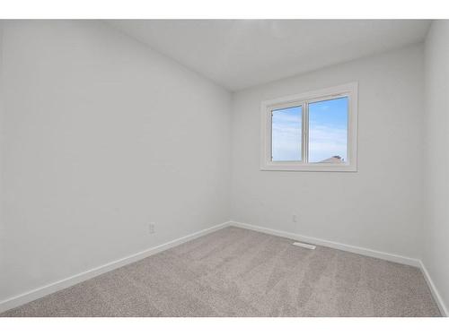 149 Belmont Way Sw, Calgary, AB - Indoor Photo Showing Other Room