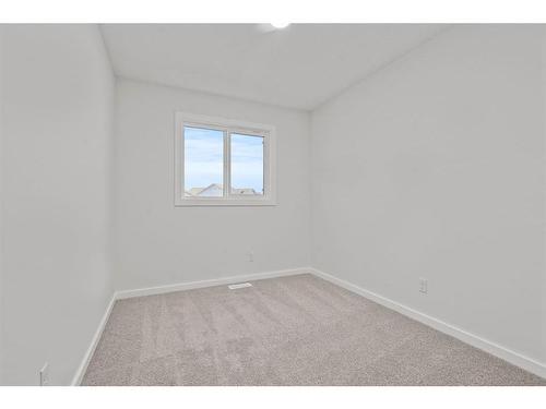 149 Belmont Way Sw, Calgary, AB - Indoor Photo Showing Other Room