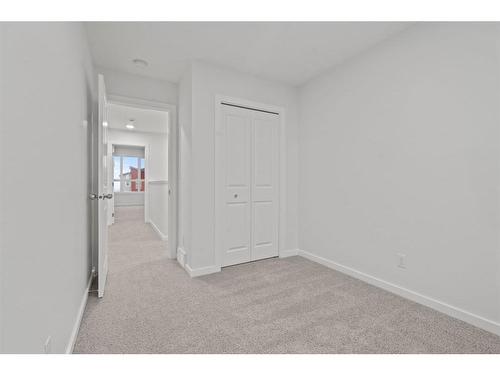 149 Belmont Way Sw, Calgary, AB - Indoor Photo Showing Other Room