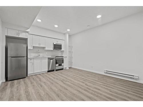 149 Belmont Way Sw, Calgary, AB - Indoor Photo Showing Kitchen