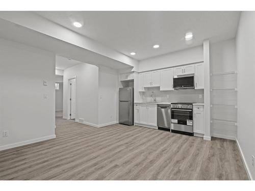 149 Belmont Way Sw, Calgary, AB - Indoor Photo Showing Kitchen