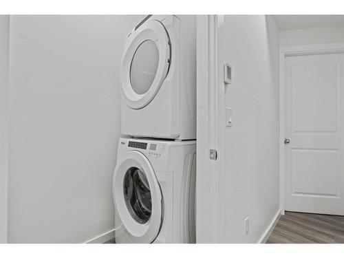 149 Belmont Way Sw, Calgary, AB - Indoor Photo Showing Laundry Room