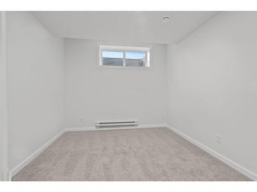 149 Belmont Way Sw, Calgary, AB - Indoor Photo Showing Other Room