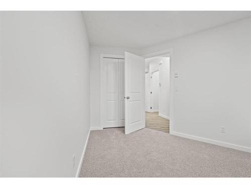 149 Belmont Way Sw, Calgary, AB - Indoor Photo Showing Other Room