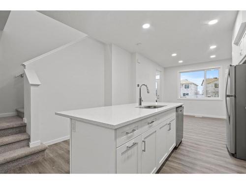 149 Belmont Way Sw, Calgary, AB - Indoor Photo Showing Kitchen