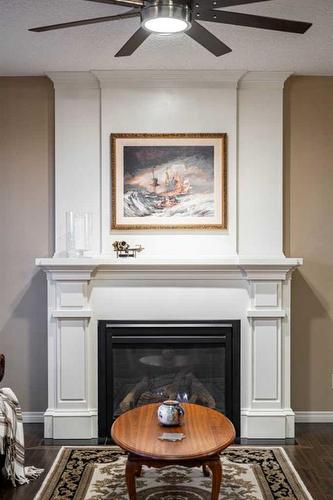 204 Auburn Springs Close Se, Calgary, AB - Indoor Photo Showing Living Room With Fireplace