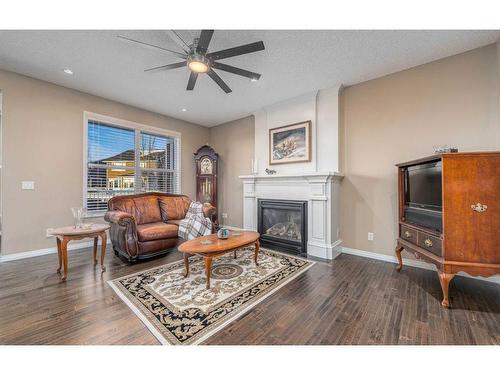 204 Auburn Springs Close Se, Calgary, AB - Indoor Photo Showing Living Room With Fireplace