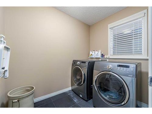 204 Auburn Springs Close Se, Calgary, AB - Indoor Photo Showing Laundry Room