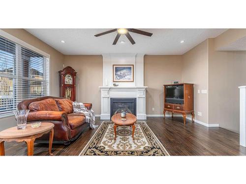 204 Auburn Springs Close Se, Calgary, AB - Indoor Photo Showing Living Room With Fireplace